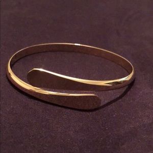 Gold adjustable bracelet.